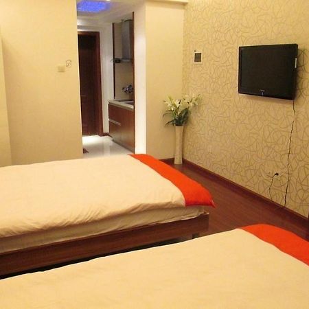Chengdu Xinyiju Hotel Apartment Exterior photo